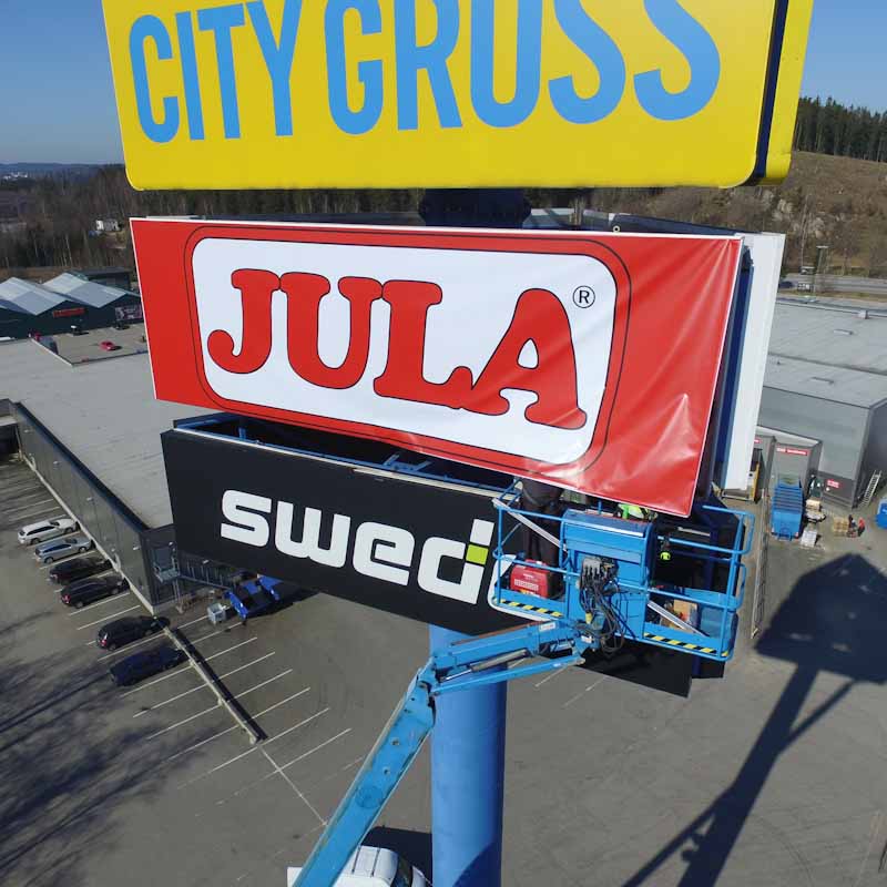 Sign installation using a skylift